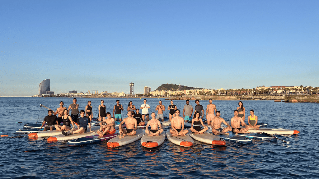 Team building Barcelona sup yoga sunrise SUP Yoga Cat team building barcelona